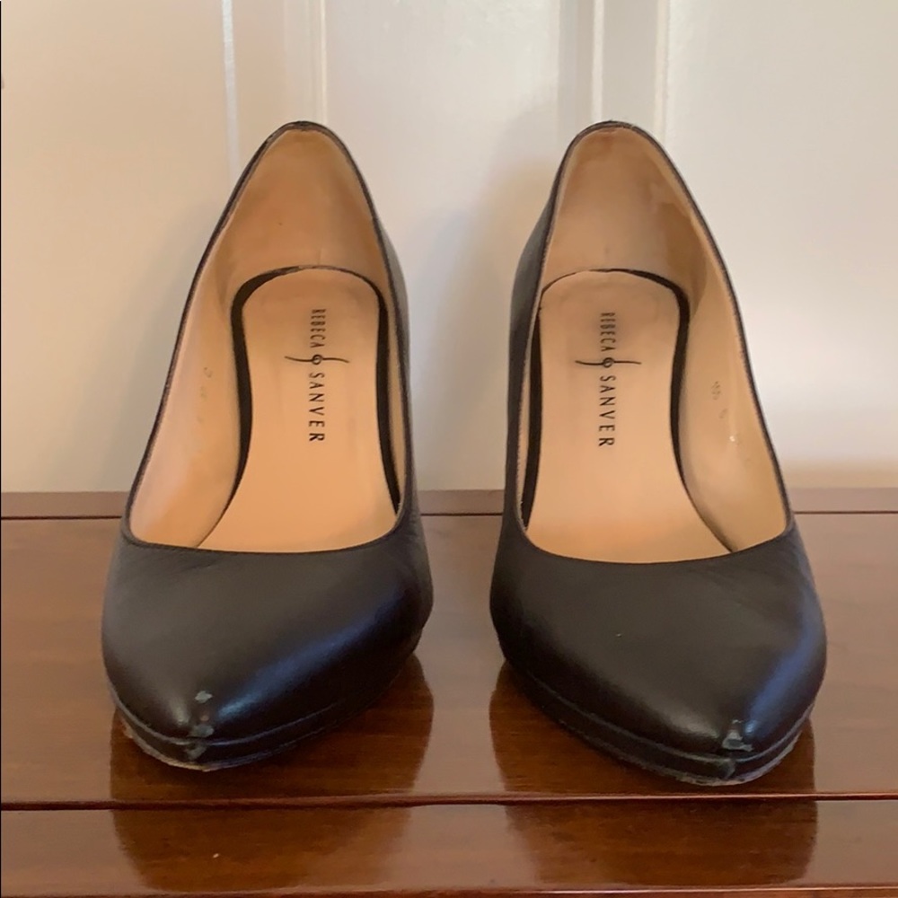 Women’s brown leather pumps